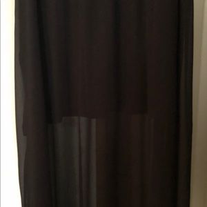 Black skirt with slits and sheer overlay